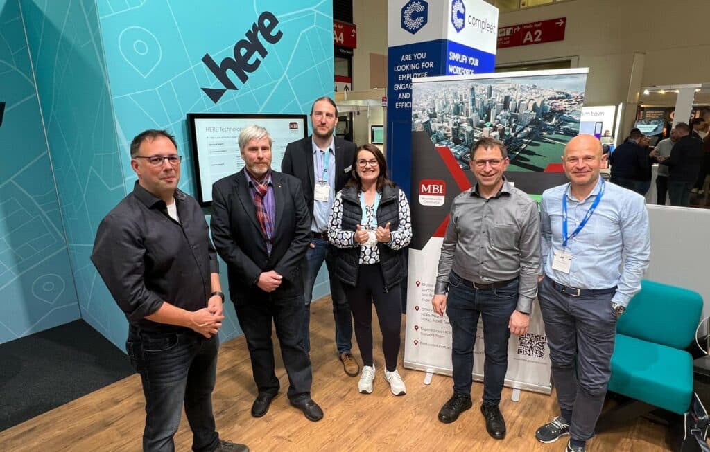 Our Head of Location Services Carina Ziegelmüller with various HERE solutions partners at Transport Logistic in Munich 2023