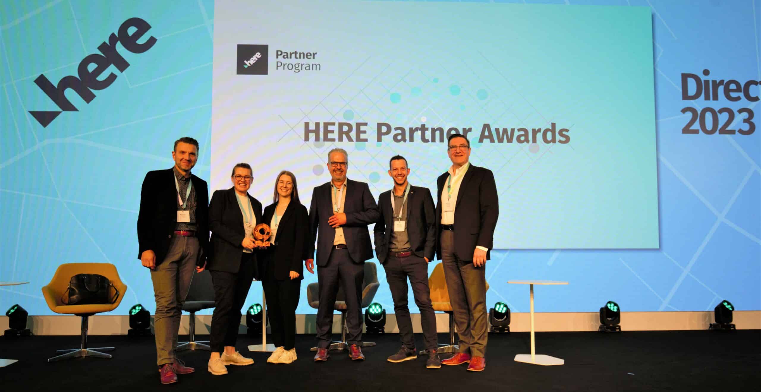 The MBI Team receiving the award for "HERE Distributor of the Year 2023" from John Ramieri, Vice President of Sales and Business Development at HERE Technologies
